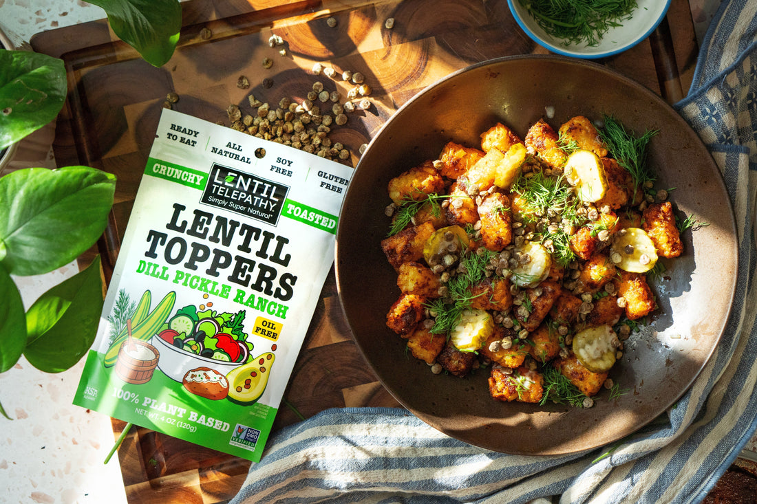 Loaded Nashville hot tater tots topped with dill pickles, ranch, fresh herbs, hot honey and crunchy toasted lentils.
